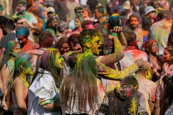 Energy and smiles are seen at Holi Festival in Kamloops. 