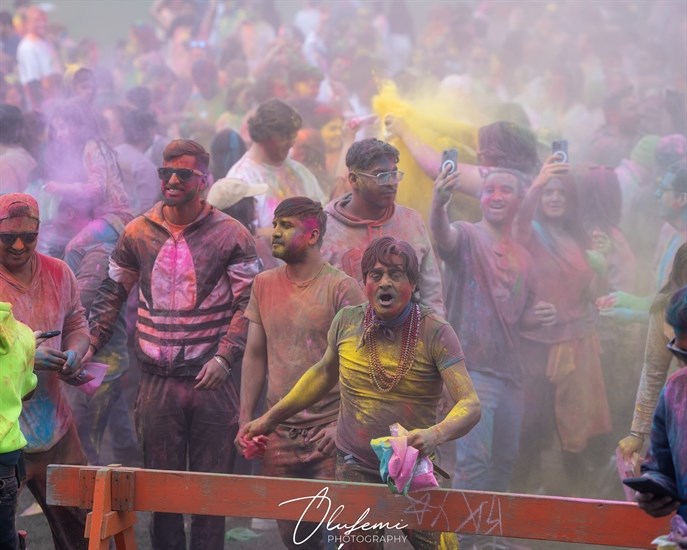 Big crowds are covered with water and coloured powder at Holi Festival in Kamloops. 