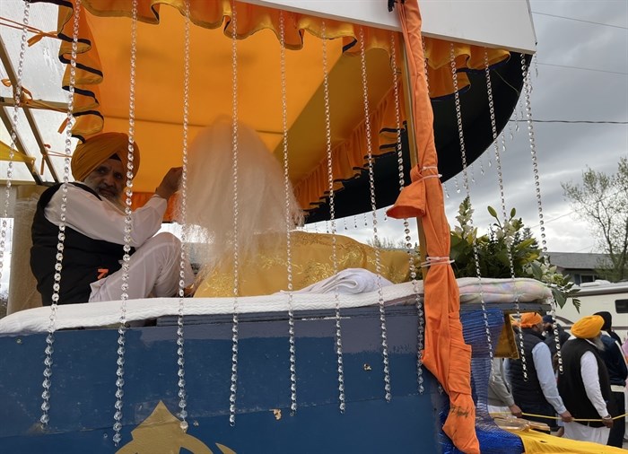 A man on a parade float during the Vaisakhi parade on April 27, 2024.