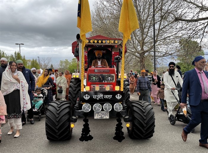 A tractor pulling a float during the Vaisakhi parade on April 27, 2024.